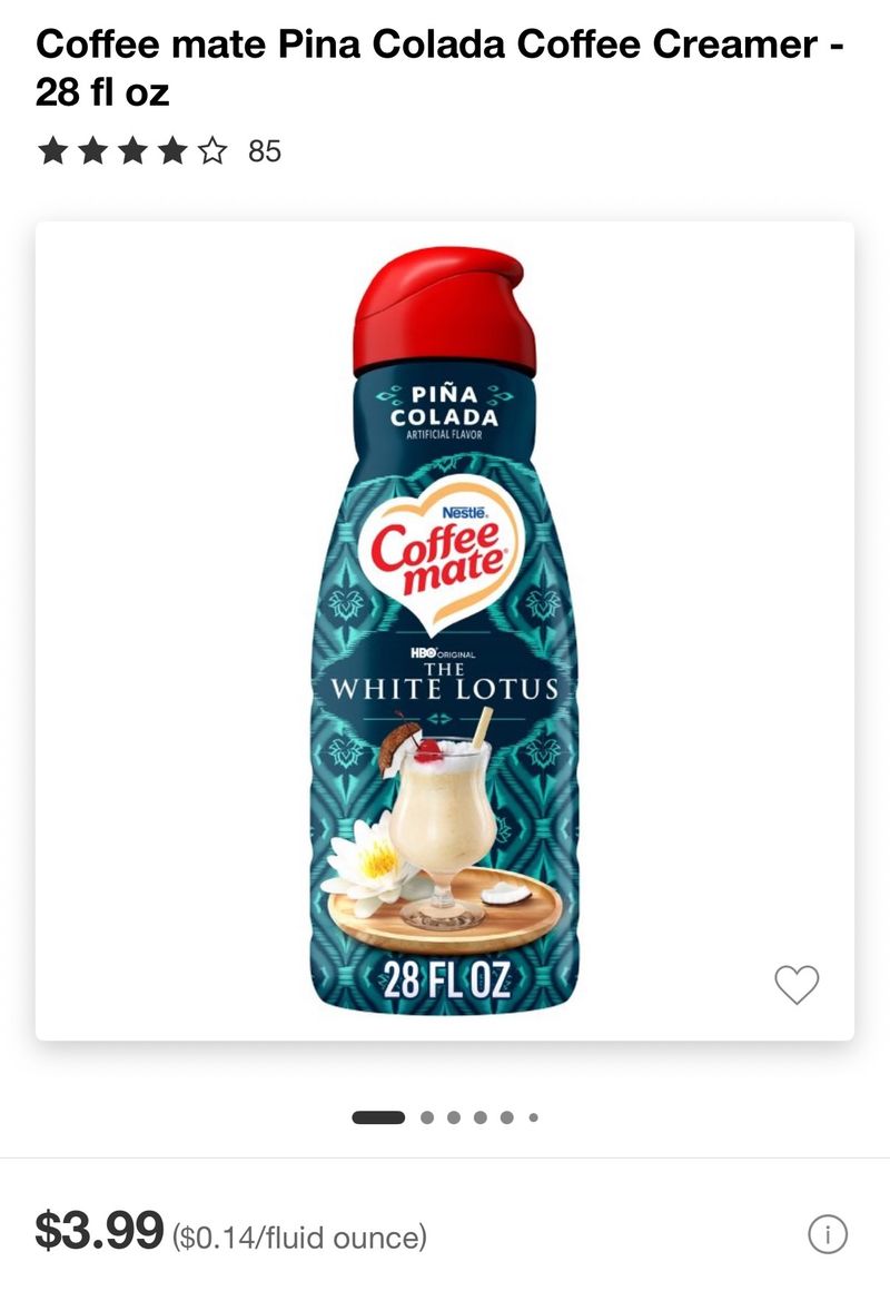 A bottle of Piña Colada coffee creamer from Coffee-mate, with "The White Lotus" branding.